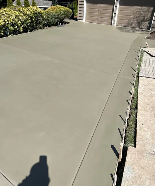 Broom Finish Driveway With Decorative Borders in Edmonds 
